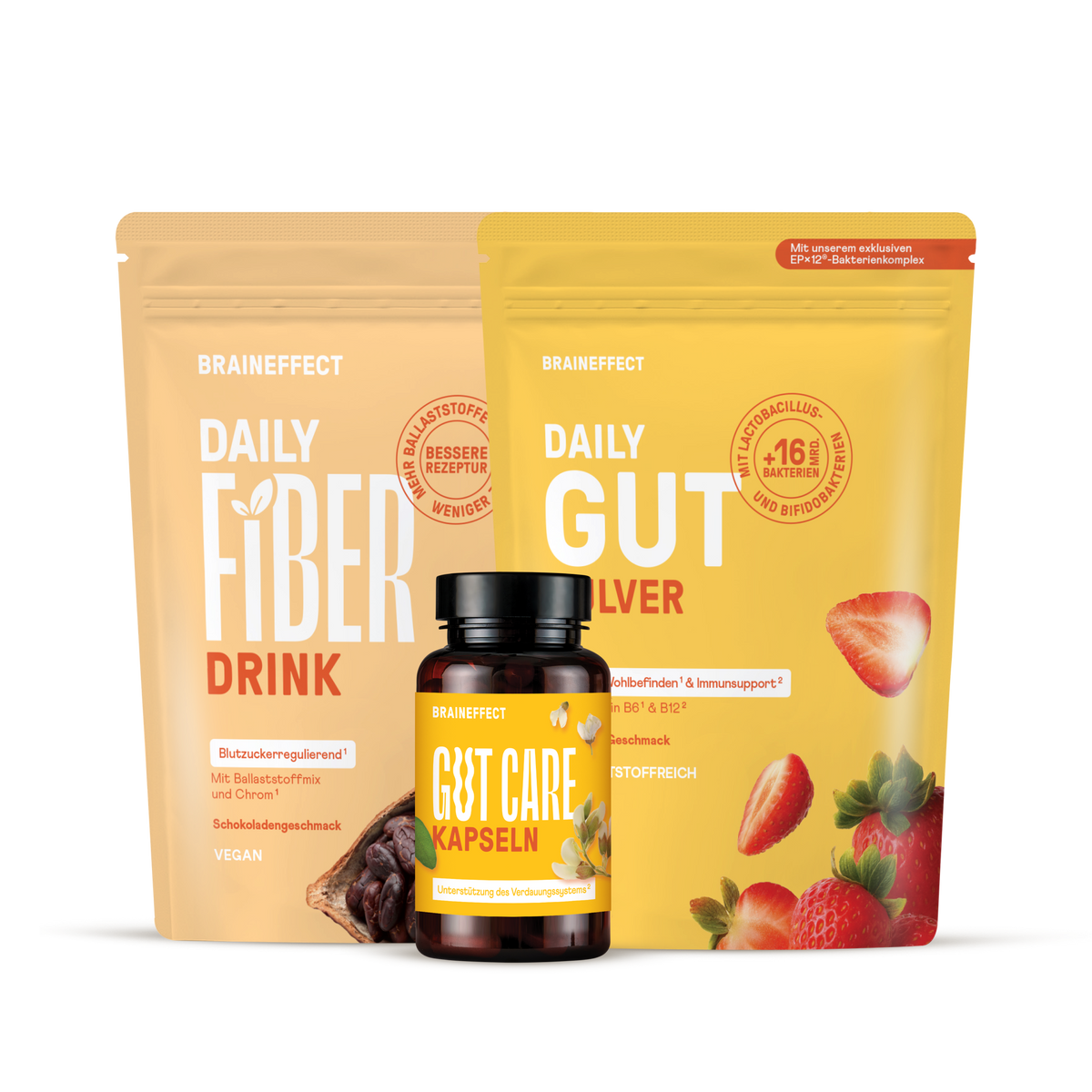 Zwei Nachfüllbeutel und eine Dose BRAINEFFECT-Produkte mit den Aufschriften "BRAINEFFECT DAILY FIBER DRINK", "BRAINEFFECT DAILY GUT" und "BRAINEFFECT GUT CARE KAPSELN" vor schwarzem Hintergrund.