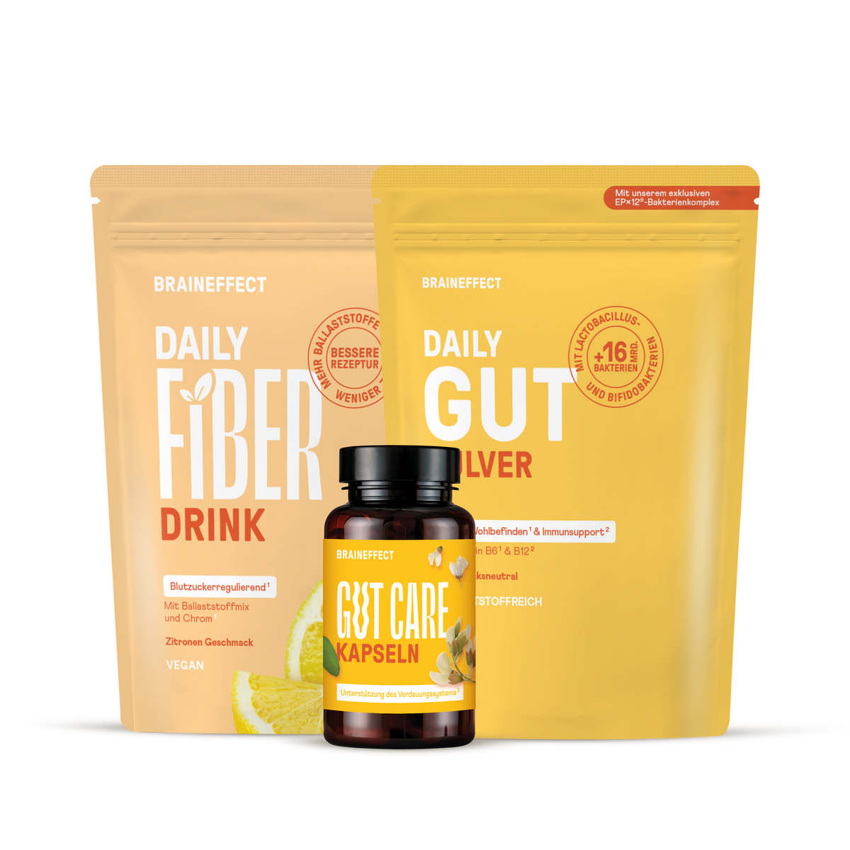 Zwei Produktbeutel und eine Kapseldose von BRAINEFFECT mit den Aufschriften "BRAINEFFECT DAILY FIBER DRINK", "BRAINEFFECT GUT CARE KAPSELN" und "BRAINEFFECT DAILY GUT"