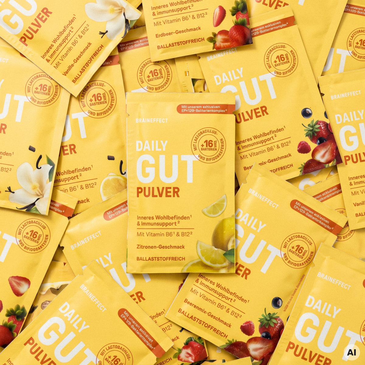 Several yellow BRAINEFFECT "DAILY GUT PULVER" single-serving sticks in various flavors, featuring the text "Inneres Wohlbefinden und Immunsupport Mit Vitamin B6 und B12"