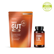 BRAINEFFECT Daily Gut + Immunity Beutel und Vitamin C & Zink Kapseln Dose vor weißem Hintergrund mit den Aufschriften "DAILY GUT + IMMUNITY", "VITAMIN C & ZINK KAPSELN" und "LABOR-GEPRÜFT LEBENDE BAKTERIEN verifiziert VERMICON".
