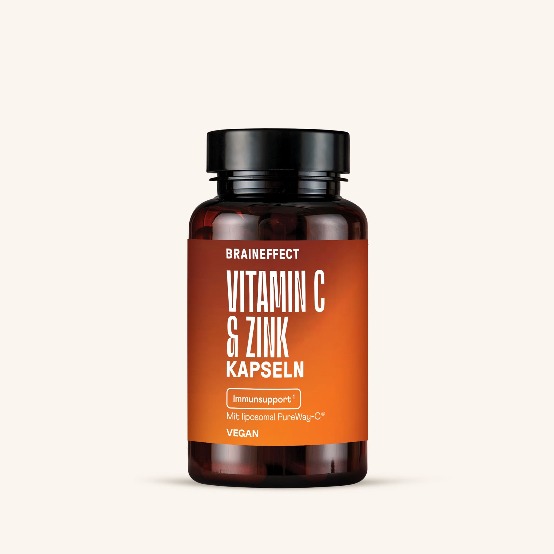 Brown bottle containing Vitamin C and Zinc capsules, designed for daily rituals supporting immune health.